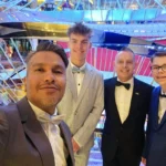 Cruising with Danny and Peter, Holland America Line, Nieuw Statendam, English Channel, Sea Day, English Channel Nieuw Statendam Sea Day Experience | A luxurious scene aboard Holland America Line’s Nieuw Statendam cruising the English Channel, featuring the Main Dining Room with elegantly set tables, gourmet dishes like eggs Benedict, and large windows revealing gray-green waves; the intimate Pinnacle Grill with plush seating and a plated beef tenderloin with lobster dumplings; the World Stage theater’s circular stage and vibrant 270-degree LED screen displaying Casablanca’s Hassan II Mosque; and the ship’s sleek white hull sailing smoothly under an overcast sky, embodying modern cruising elegance.