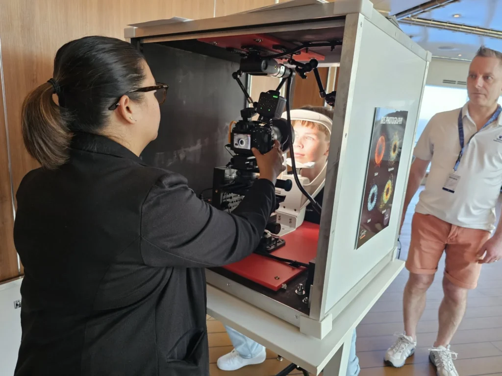 Cruising with Danny and Peter, Holland America Line, Nieuw Statendam, Atlantic Ocean Sea Day Experience | A vibrant collage capturing a sea day on Holland America’s Nieuw Statendam: a panoramic view of the Atlantic Ocean’s deep blue waves under golden sunlight from the ship’s deck; an elegant breakfast of eggs Benedict and coffee in the Main Dining Room with ocean-view windows; a digital iris collage with colorful, galaxy-like patterns created in the Explorations Central lounge; and a lively Cassidy Robertson & Company performance on the World Stage, featuring dancers in vibrant costumes against a futuristic LED backdrop.