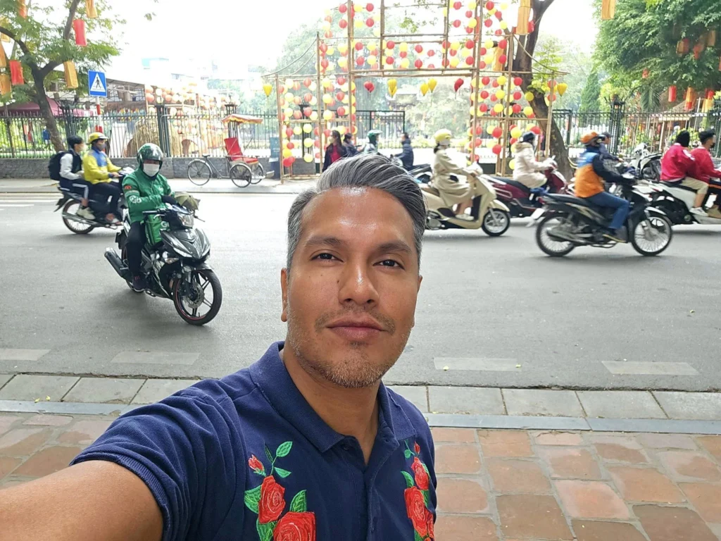 Cruising with Danny and Peter, Holland America Line, Westerdam, Halong Bay, Hanoi, Vietnam, Vietnam Travel Eexperience Hanoi Halong Bay | Kayaking through emerald waters during a Hạ Long Bay Adventure with limestone karsts, a train passing inches from cafés on Hanoi Railway Street showcasing Hanoi Street Life, the granite Ho Chi Minh Mausoleum in Ba Dinh Square honoring the Ho Chi Minh Legacy, the lotus-shaped One Pillar Pagoda in a pond among Hanoi Historical Sites, ancient courtyards of the Temple of Literature from a Vietnam Heritage Journey, vibrant street food stalls in an Old Quarter Food Tour, and creamy egg coffee at Cafe Giảng for an Egg Coffee Experience, all part of an unforgettable Vietnam Travel Experience and Hanoi Cultural Exploration Tour.