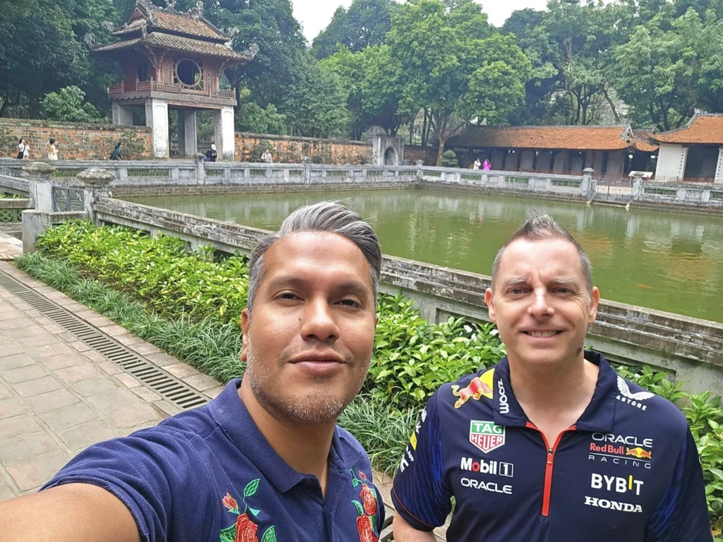 Cruising with Danny and Peter, Holland America Line, Westerdam, Halong Bay, Hanoi, Vietnam, Vietnam Travel Eexperience Hanoi Halong Bay | Kayaking through emerald waters during a Hạ Long Bay Adventure with limestone karsts, a train passing inches from cafés on Hanoi Railway Street showcasing Hanoi Street Life, the granite Ho Chi Minh Mausoleum in Ba Dinh Square honoring the Ho Chi Minh Legacy, the lotus-shaped One Pillar Pagoda in a pond among Hanoi Historical Sites, ancient courtyards of the Temple of Literature from a Vietnam Heritage Journey, vibrant street food stalls in an Old Quarter Food Tour, and creamy egg coffee at Cafe Giảng for an Egg Coffee Experience, all part of an unforgettable Vietnam Travel Experience and Hanoi Cultural Exploration Tour.