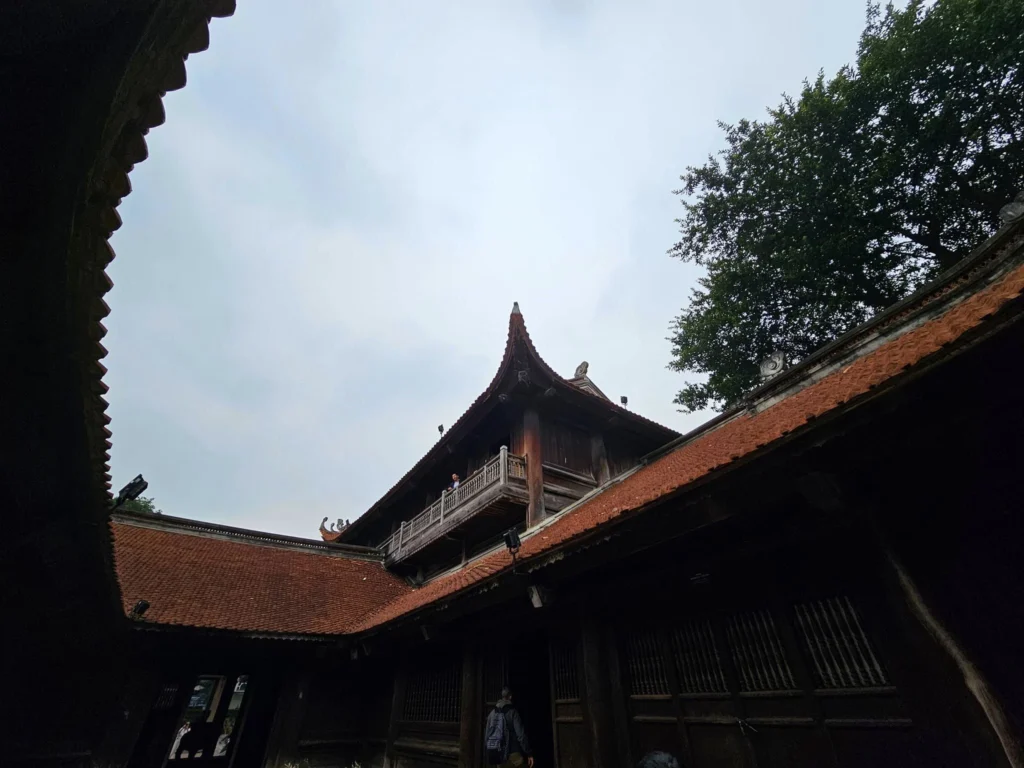 Cruising with Danny and Peter, Holland America Line, Westerdam, Halong Bay, Hanoi, Vietnam, Vietnam Travel Eexperience Hanoi Halong Bay | Kayaking through emerald waters during a Hạ Long Bay Adventure with limestone karsts, a train passing inches from cafés on Hanoi Railway Street showcasing Hanoi Street Life, the granite Ho Chi Minh Mausoleum in Ba Dinh Square honoring the Ho Chi Minh Legacy, the lotus-shaped One Pillar Pagoda in a pond among Hanoi Historical Sites, ancient courtyards of the Temple of Literature from a Vietnam Heritage Journey, vibrant street food stalls in an Old Quarter Food Tour, and creamy egg coffee at Cafe Giảng for an Egg Coffee Experience, all part of an unforgettable Vietnam Travel Experience and Hanoi Cultural Exploration Tour.