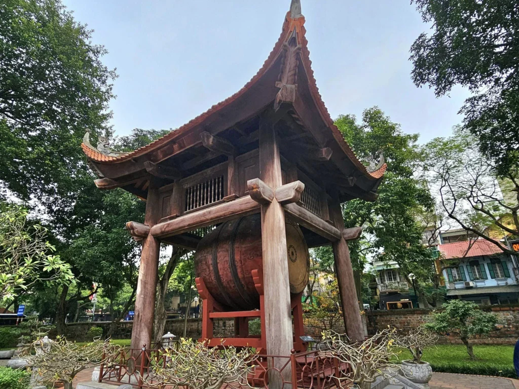 Cruising with Danny and Peter, Holland America Line, Westerdam, Halong Bay, Hanoi, Vietnam, Vietnam Travel Eexperience Hanoi Halong Bay | Kayaking through emerald waters during a Hạ Long Bay Adventure with limestone karsts, a train passing inches from cafés on Hanoi Railway Street showcasing Hanoi Street Life, the granite Ho Chi Minh Mausoleum in Ba Dinh Square honoring the Ho Chi Minh Legacy, the lotus-shaped One Pillar Pagoda in a pond among Hanoi Historical Sites, ancient courtyards of the Temple of Literature from a Vietnam Heritage Journey, vibrant street food stalls in an Old Quarter Food Tour, and creamy egg coffee at Cafe Giảng for an Egg Coffee Experience, all part of an unforgettable Vietnam Travel Experience and Hanoi Cultural Exploration Tour.