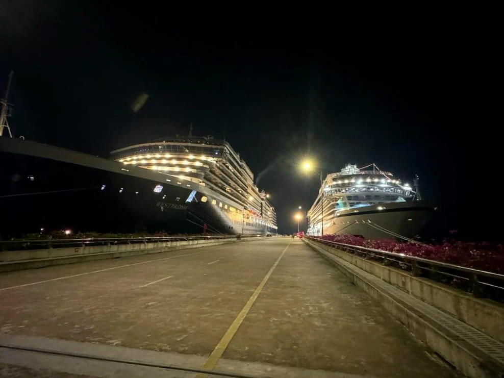 Cruising with Danny and Peter, Holland America Line, Westerdam, Halong Bay, Hanoi, Vietnam, Vietnam Travel Eexperience Hanoi Halong Bay | Kayaking through emerald waters during a Hạ Long Bay Adventure with limestone karsts, a train passing inches from cafés on Hanoi Railway Street showcasing Hanoi Street Life, the granite Ho Chi Minh Mausoleum in Ba Dinh Square honoring the Ho Chi Minh Legacy, the lotus-shaped One Pillar Pagoda in a pond among Hanoi Historical Sites, ancient courtyards of the Temple of Literature from a Vietnam Heritage Journey, vibrant street food stalls in an Old Quarter Food Tour, and creamy egg coffee at Cafe Giảng for an Egg Coffee Experience, all part of an unforgettable Vietnam Travel Experience and Hanoi Cultural Exploration Tour.