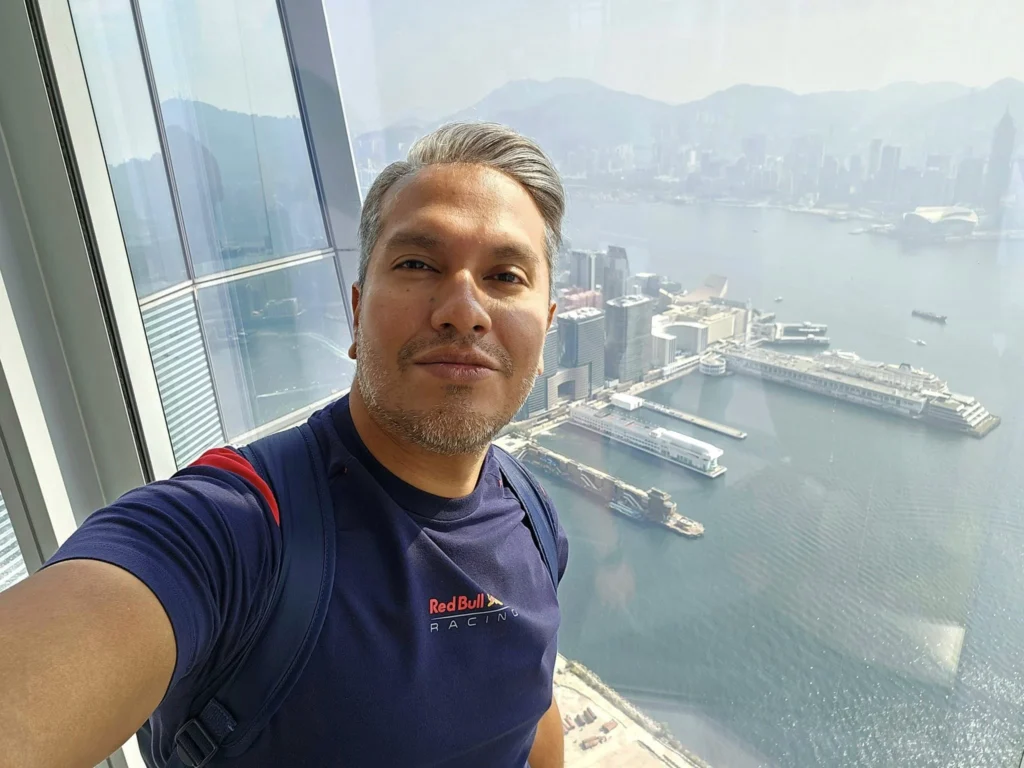 Cruising with Danny and Peter, Holland America Line, Westerdam, Hong Kong, China, Hong Kong Travel Guide: 10 Irresistible Gems | Panoramic Hong Kong Skyline Views from Sky100 Observation Deck showcasing Victoria Harbour and glittering skyscrapers at dusk, paired with a vibrant Temple Street Market scene featuring colorful stalls offering Hong Kong Street Food like dim sum, egg tarts, wonton noodles, and crispy fish balls in a bustling Hong Kong Night Markets atmosphere, alongside a scenic Tsim Sha Tsui Promenade view of Victoria Harbour with illuminated Hong Kong Skyline Views perfect for Hong Kong Tourism evenings, and the Holland America Line’s Westerdam docked in Hong Kong, marking the end of a Cruise Travel Hong Kong journey with Hong Kong Attractions in the background.