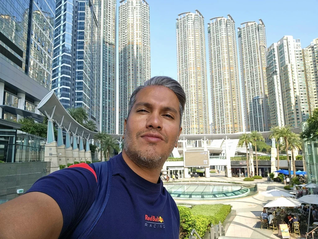 Cruising with Danny and Peter, Holland America Line, Westerdam, Hong Kong, China, Hong Kong Travel Guide: 10 Irresistible Gems | Panoramic Hong Kong Skyline Views from Sky100 Observation Deck showcasing Victoria Harbour and glittering skyscrapers at dusk, paired with a vibrant Temple Street Market scene featuring colorful stalls offering Hong Kong Street Food like dim sum, egg tarts, wonton noodles, and crispy fish balls in a bustling Hong Kong Night Markets atmosphere, alongside a scenic Tsim Sha Tsui Promenade view of Victoria Harbour with illuminated Hong Kong Skyline Views perfect for Hong Kong Tourism evenings, and the Holland America Line’s Westerdam docked in Hong Kong, marking the end of a Cruise Travel Hong Kong journey with Hong Kong Attractions in the background.