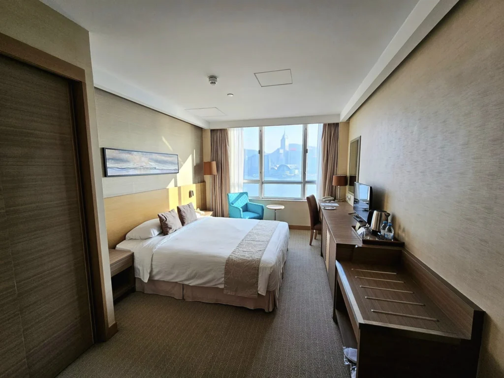 Cruising with Danny and Peter, Holland America Line, Westerdam, Hong Kong, China, Hong Kong Travel Guide: 10 Irresistible Gems | Panoramic Hong Kong Skyline Views from Sky100 Observation Deck showcasing Victoria Harbour and glittering skyscrapers at dusk, paired with a vibrant Temple Street Market scene featuring colorful stalls offering Hong Kong Street Food like dim sum, egg tarts, wonton noodles, and crispy fish balls in a bustling Hong Kong Night Markets atmosphere, alongside a scenic Tsim Sha Tsui Promenade view of Victoria Harbour with illuminated Hong Kong Skyline Views perfect for Hong Kong Tourism evenings, and the Holland America Line’s Westerdam docked in Hong Kong, marking the end of a Cruise Travel Hong Kong journey with Hong Kong Attractions in the background.