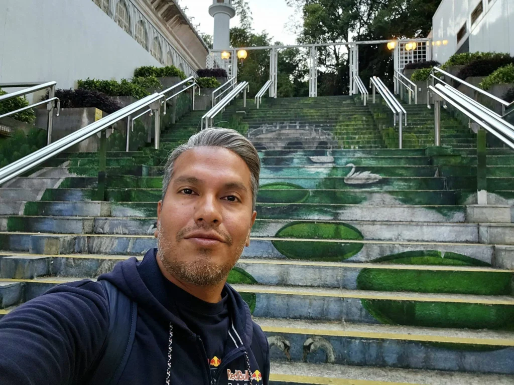 Cruising with Danny and Peter, Holland America Line, Westerdam, Hong Kong, China, Hong Kong Travel Guide: 10 Irresistible Gems | Panoramic Hong Kong Skyline Views from Sky100 Observation Deck showcasing Victoria Harbour and glittering skyscrapers at dusk, paired with a vibrant Temple Street Market scene featuring colorful stalls offering Hong Kong Street Food like dim sum, egg tarts, wonton noodles, and crispy fish balls in a bustling Hong Kong Night Markets atmosphere, alongside a scenic Tsim Sha Tsui Promenade view of Victoria Harbour with illuminated Hong Kong Skyline Views perfect for Hong Kong Tourism evenings, and the Holland America Line’s Westerdam docked in Hong Kong, marking the end of a Cruise Travel Hong Kong journey with Hong Kong Attractions in the background.