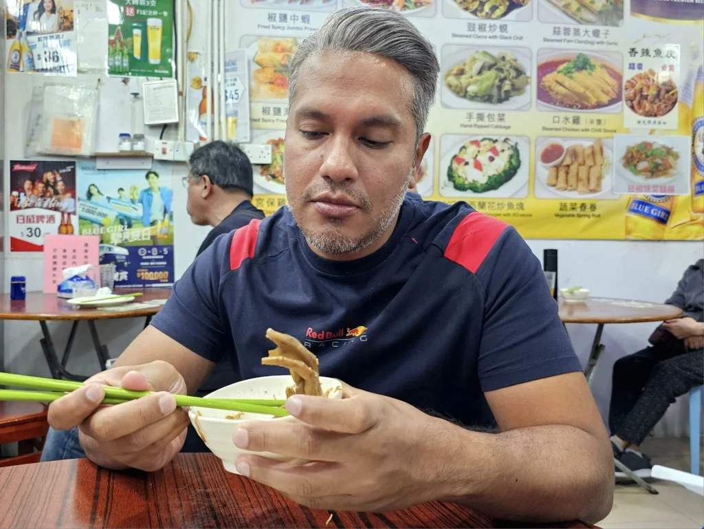 Cruising with Danny and Peter, Holland America Line, Westerdam, Hong Kong, China, Hong Kong Travel Guide: 10 Irresistible Gems | Panoramic Hong Kong Skyline Views from Sky100 Observation Deck showcasing Victoria Harbour and glittering skyscrapers at dusk, paired with a vibrant Temple Street Market scene featuring colorful stalls offering Hong Kong Street Food like dim sum, egg tarts, wonton noodles, and crispy fish balls in a bustling Hong Kong Night Markets atmosphere, alongside a scenic Tsim Sha Tsui Promenade view of Victoria Harbour with illuminated Hong Kong Skyline Views perfect for Hong Kong Tourism evenings, and the Holland America Line’s Westerdam docked in Hong Kong, marking the end of a Cruise Travel Hong Kong journey with Hong Kong Attractions in the background.