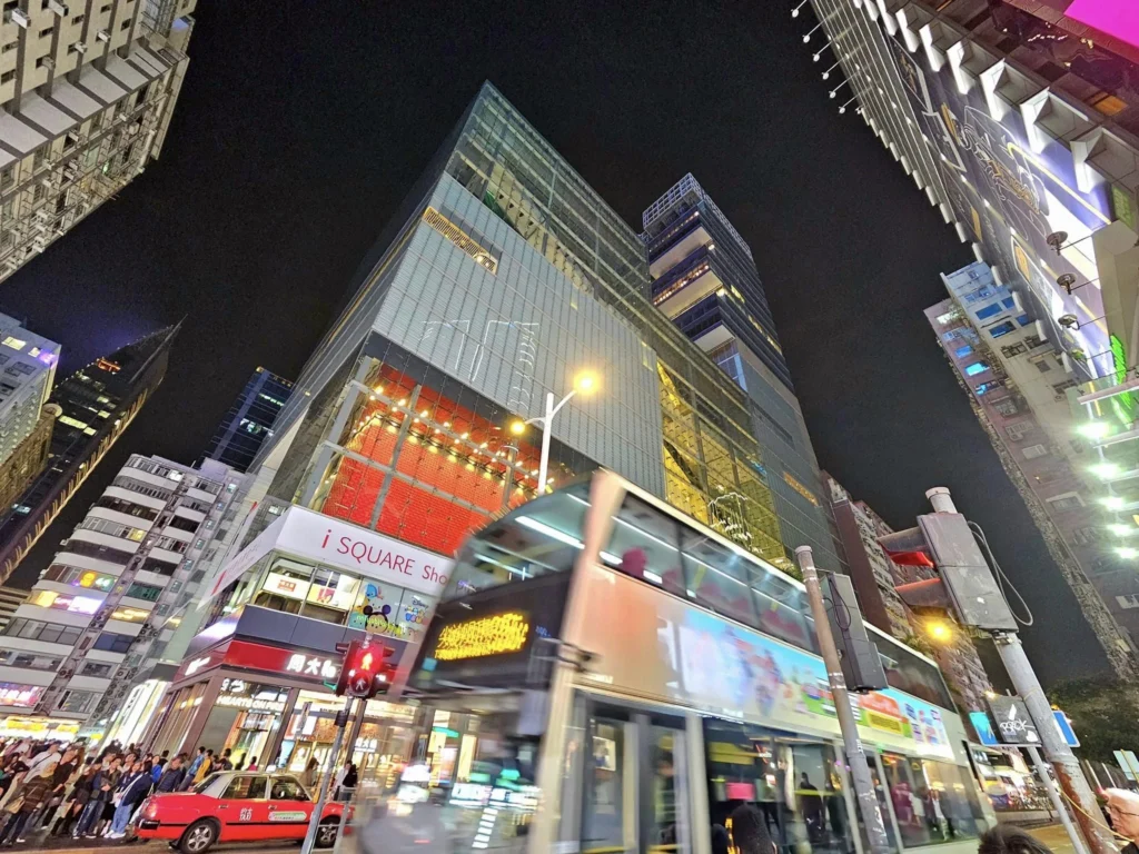 Cruising with Danny and Peter, Holland America Line, Westerdam, Hong Kong, China, Hong Kong Travel Guide: 10 Irresistible Gems | Panoramic Hong Kong Skyline Views from Sky100 Observation Deck showcasing Victoria Harbour and glittering skyscrapers at dusk, paired with a vibrant Temple Street Market scene featuring colorful stalls offering Hong Kong Street Food like dim sum, egg tarts, wonton noodles, and crispy fish balls in a bustling Hong Kong Night Markets atmosphere, alongside a scenic Tsim Sha Tsui Promenade view of Victoria Harbour with illuminated Hong Kong Skyline Views perfect for Hong Kong Tourism evenings, and the Holland America Line’s Westerdam docked in Hong Kong, marking the end of a Cruise Travel Hong Kong journey with Hong Kong Attractions in the background.