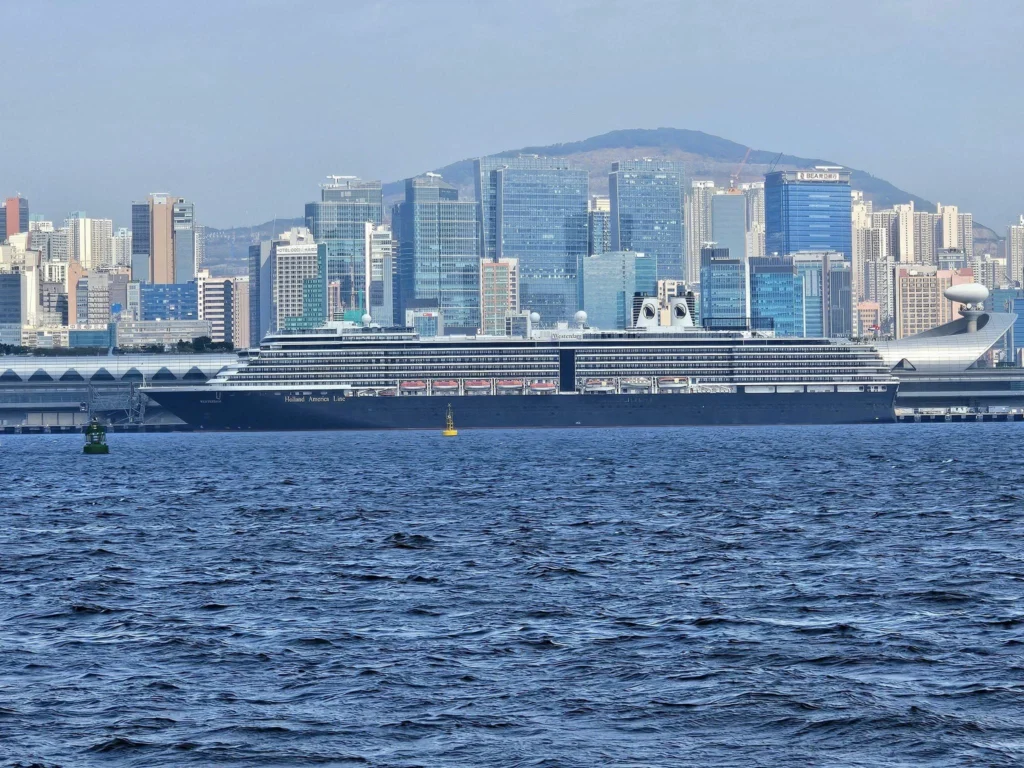 A Journey to Remember: Our Tsim Sha Tsui Travel Experience Aboard the Westerdam and Beyond 14 Cruising with Danny and Peter, Holland America Line, Westerdam, Hong Kong, China, Tsim Sha Tsui Travel Experience | Reliving our Tsim Sha Tsui Travel Experience: savoring Local Hong Kong Food like creamy eggs and sweet bacon, admiring the Hong Kong Skyline from Tsim Sha Tsui Promenade, bidding farewell to the Westerdam Cruise on a Harbor Tour Hong Kong across Victoria Harbour, exploring Hong Kong Shopping in vibrant markets and boutiques, and marveling at Hong Kong Night Lights illuminating the skyline from our hotel in Tsim Sha Tsui.