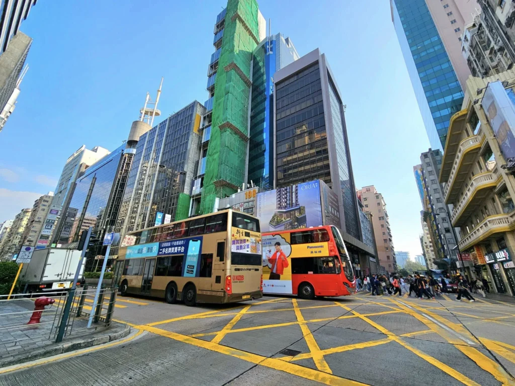 A Journey to Remember: Our Tsim Sha Tsui Travel Experience Aboard the Westerdam and Beyond 15 Cruising with Danny and Peter, Holland America Line, Westerdam, Hong Kong, China, Tsim Sha Tsui Travel Experience | Reliving our Tsim Sha Tsui Travel Experience: savoring Local Hong Kong Food like creamy eggs and sweet bacon, admiring the Hong Kong Skyline from Tsim Sha Tsui Promenade, bidding farewell to the Westerdam Cruise on a Harbor Tour Hong Kong across Victoria Harbour, exploring Hong Kong Shopping in vibrant markets and boutiques, and marveling at Hong Kong Night Lights illuminating the skyline from our hotel in Tsim Sha Tsui.