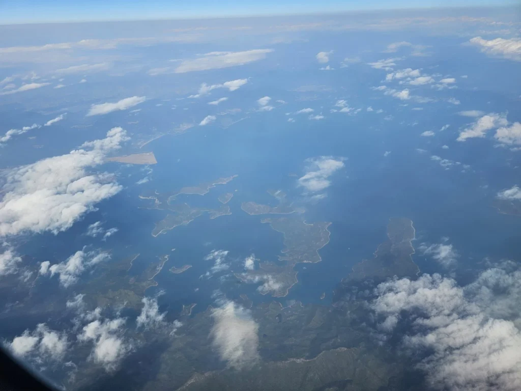 Cruising with Danny and Peter, Holland America Line, Westerdam, Hong Kong, China | Stunning landscape captured by professional cruise photographer during our Asian cruise, showcasing vibrant coastal towns and serene seascapes.