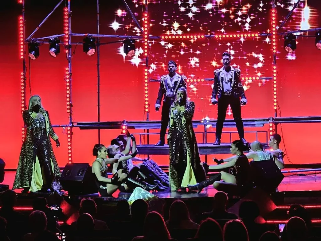 Cruising with Danny and Peter, MSC Cruises, MSC Preziosa, Rotterdam, The Netherlands, MSC Preziosa Cruise departing from Rotterdam Cruise Port, showcasing the luxurious MSC Cruises experience on the Northern Europe Cruise. Passengers enjoying a seamless embarkation process, followed by elegant dining at Il Cappuccino, indulging in world-class cruise dining & shows. Exciting onboard entertainment, including a thrilling 4D cinema experience at XD Studio and the electrifying Rock Nation performance at the Platinum Theatre. Guests dancing at the vibrant MSC White Party in the Safari Lounge, highlighting the unforgettable European cruise experience. Stunning ocean views and luxury cruise vacation moments captured along the MSC Preziosa Itinerary through breathtaking North Sea Travel.