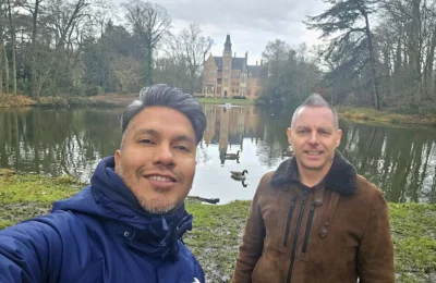 Cruising with Danny and Peter, MSC Cruises, MSC Preziosa, Zeebrugge, Brussels, Belgium, Exploring Loppem Castle in Flanders, a stunning example of Neo-Gothic Belgium architecture, surrounded by lush gardens and an intricate hedge maze. The historic canals of Flanders and Belgium medieval towns, including Damme bookshops and Bruges windmills, add to the region’s timeless charm. Inside the castle, beautifully preserved furnishings and stained-glass windows showcase the grandeur of Flanders historical sites. Indulging in Belgian chocolate tasting at Roose’s Chocolate World provides a sweet interlude. The Pieter Bruegel art tour and an MSC Northern Europe cruise complete this unforgettable Flanders travel experience.