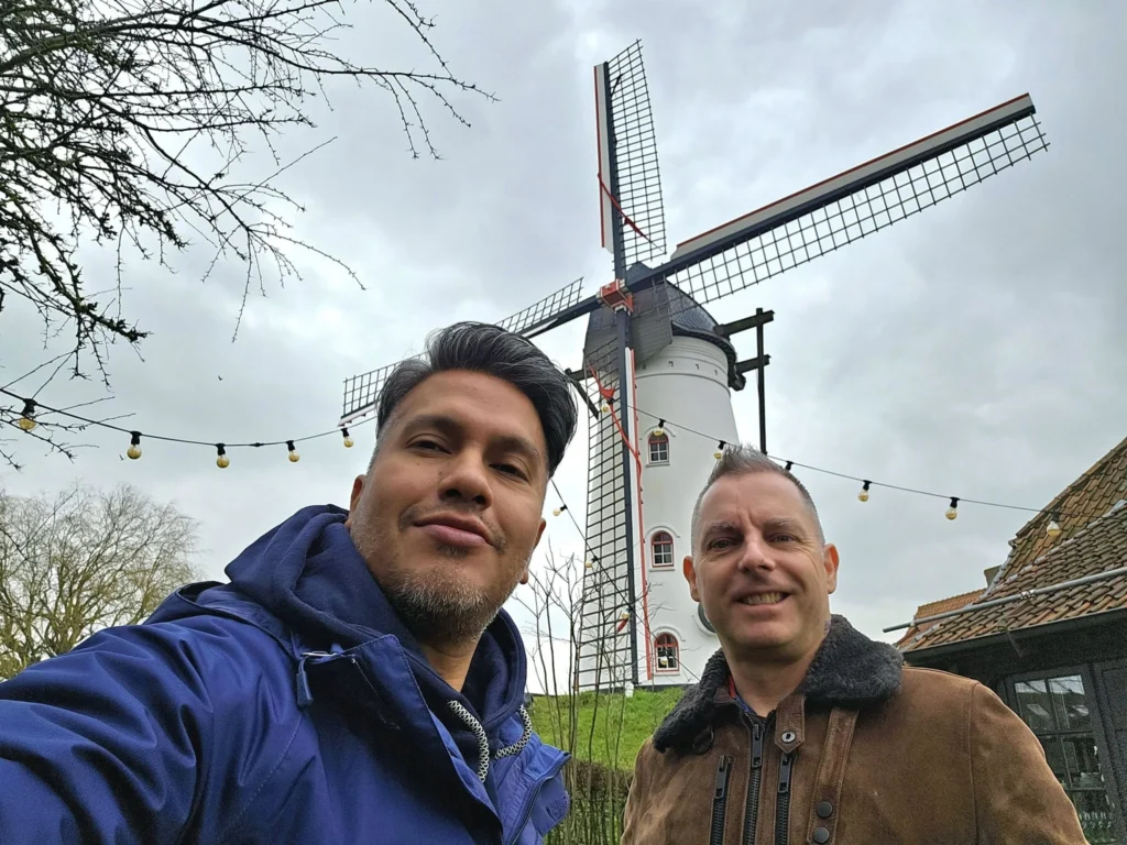 Cruising with Danny and Peter, MSC Cruises, MSC Preziosa, Zeebrugge, Brussels, Belgium, Exploring Loppem Castle in Flanders, a stunning example of Neo-Gothic Belgium architecture, surrounded by lush gardens and an intricate hedge maze. The historic canals of Flanders and Belgium medieval towns, including Damme bookshops and Bruges windmills, add to the region’s timeless charm. Inside the castle, beautifully preserved furnishings and stained-glass windows showcase the grandeur of Flanders historical sites. Indulging in Belgian chocolate tasting at Roose’s Chocolate World provides a sweet interlude. The Pieter Bruegel art tour and an MSC Northern Europe cruise complete this unforgettable Flanders travel experience.