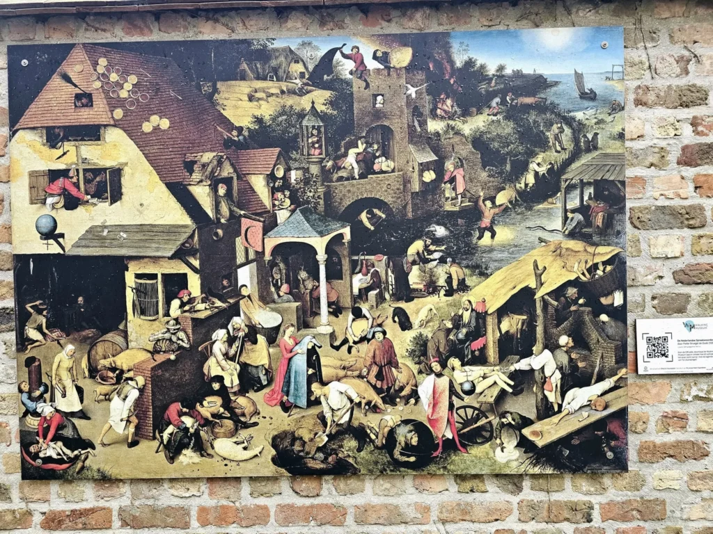 Cruising with Danny and Peter, MSC Cruises, MSC Preziosa, Zeebrugge, Brussels, Belgium, Exploring Loppem Castle in Flanders, a stunning example of Neo-Gothic Belgium architecture, surrounded by lush gardens and an intricate hedge maze. The historic canals of Flanders and Belgium medieval towns, including Damme bookshops and Bruges windmills, add to the region’s timeless charm. Inside the castle, beautifully preserved furnishings and stained-glass windows showcase the grandeur of Flanders historical sites. Indulging in Belgian chocolate tasting at Roose’s Chocolate World provides a sweet interlude. The Pieter Bruegel art tour and an MSC Northern Europe cruise complete this unforgettable Flanders travel experience.