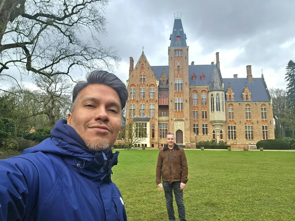 Cruising with Danny and Peter, MSC Cruises, MSC Preziosa, Zeebrugge, Brussels, Belgium, Exploring Loppem Castle in Flanders, a stunning example of Neo-Gothic Belgium architecture, surrounded by lush gardens and an intricate hedge maze. The historic canals of Flanders and Belgium medieval towns, including Damme bookshops and Bruges windmills, add to the region’s timeless charm. Inside the castle, beautifully preserved furnishings and stained-glass windows showcase the grandeur of Flanders historical sites. Indulging in Belgian chocolate tasting at Roose’s Chocolate World provides a sweet interlude. The Pieter Bruegel art tour and an MSC Northern Europe cruise complete this unforgettable Flanders travel experience.