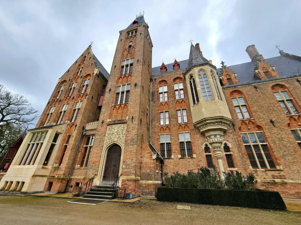 Cruising with Danny and Peter, MSC Cruises, MSC Preziosa, Zeebrugge, Brussels, Belgium, Exploring Loppem Castle in Flanders, a stunning example of Neo-Gothic Belgium architecture, surrounded by lush gardens and an intricate hedge maze. The historic canals of Flanders and Belgium medieval towns, including Damme bookshops and Bruges windmills, add to the region’s timeless charm. Inside the castle, beautifully preserved furnishings and stained-glass windows showcase the grandeur of Flanders historical sites. Indulging in Belgian chocolate tasting at Roose’s Chocolate World provides a sweet interlude. The Pieter Bruegel art tour and an MSC Northern Europe cruise complete this unforgettable Flanders travel experience.