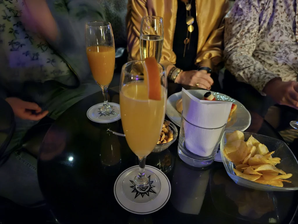 Cruising with Danny and Peter, MSC Cruises, MSC Preziosa, Zeebrugge, Brussels, Belgium, Exploring Loppem Castle in Flanders, a stunning example of Neo-Gothic Belgium architecture, surrounded by lush gardens and an intricate hedge maze. The historic canals of Flanders and Belgium medieval towns, including Damme bookshops and Bruges windmills, add to the region’s timeless charm. Inside the castle, beautifully preserved furnishings and stained-glass windows showcase the grandeur of Flanders historical sites. Indulging in Belgian chocolate tasting at Roose’s Chocolate World provides a sweet interlude. The Pieter Bruegel art tour and an MSC Northern Europe cruise complete this unforgettable Flanders travel experience.