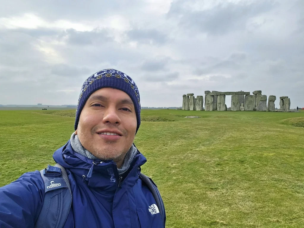 Cruising with Danny and Peter, MSC Cruises, MSC Preziosa, Southamton, London, England, United Kingdom, Stonehenge & Salisbury Tour, A breathtaking view of the Ancient Stone Circle at Stonehenge, showcasing its massive standing stones against the backdrop of the Wiltshire Countryside Trip. Visitors exploring this iconic Neolithic Monument Visit, a renowned UNESCO Heritage Site, as part of the MSC Preziosa Stonehenge and Salisbury Excursion. The towering spire of Salisbury Cathedral, the highlight of the Salisbury Cathedral Tour, stands majestically, housing the historic Magna Carta Exhibit. A scenic drive through the charming English villages on the English Countryside Tour, leading to a fascinating Medieval Town Exploration in Salisbury. This Southampton Shore Excursion offers an unforgettable journey through Historic England Landmarks, blending ancient wonders with medieval splendor.