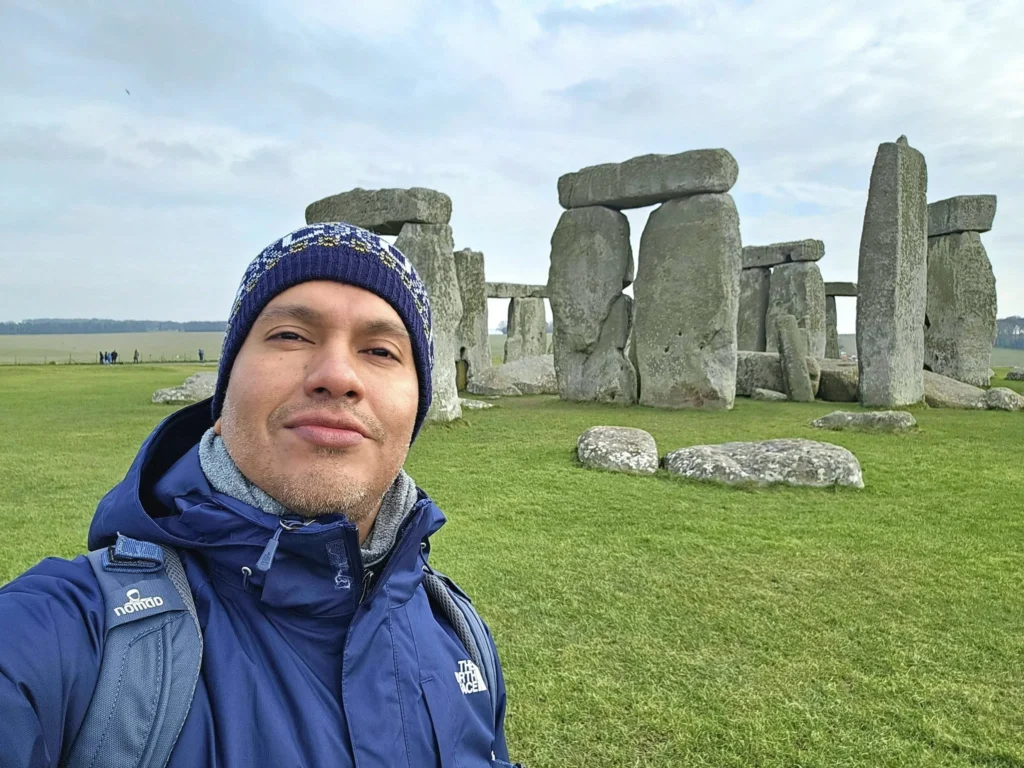 Cruising with Danny and Peter, MSC Cruises, MSC Preziosa, Southamton, London, England, United Kingdom, Stonehenge & Salisbury Tour, A breathtaking view of the Ancient Stone Circle at Stonehenge, showcasing its massive standing stones against the backdrop of the Wiltshire Countryside Trip. Visitors exploring this iconic Neolithic Monument Visit, a renowned UNESCO Heritage Site, as part of the MSC Preziosa Stonehenge and Salisbury Excursion. The towering spire of Salisbury Cathedral, the highlight of the Salisbury Cathedral Tour, stands majestically, housing the historic Magna Carta Exhibit. A scenic drive through the charming English villages on the English Countryside Tour, leading to a fascinating Medieval Town Exploration in Salisbury. This Southampton Shore Excursion offers an unforgettable journey through Historic England Landmarks, blending ancient wonders with medieval splendor.