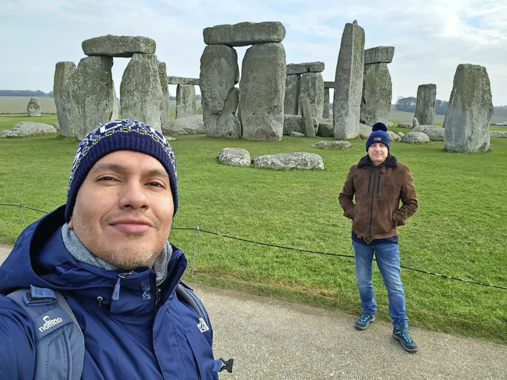 Cruising with Danny and Peter, MSC Cruises, MSC Preziosa, Southamton, London, England, United Kingdom, Stonehenge & Salisbury Tour, A breathtaking view of the Ancient Stone Circle at Stonehenge, showcasing its massive standing stones against the backdrop of the Wiltshire Countryside Trip. Visitors exploring this iconic Neolithic Monument Visit, a renowned UNESCO Heritage Site, as part of the MSC Preziosa Stonehenge and Salisbury Excursion. The towering spire of Salisbury Cathedral, the highlight of the Salisbury Cathedral Tour, stands majestically, housing the historic Magna Carta Exhibit. A scenic drive through the charming English villages on the English Countryside Tour, leading to a fascinating Medieval Town Exploration in Salisbury. This Southampton Shore Excursion offers an unforgettable journey through Historic England Landmarks, blending ancient wonders with medieval splendor.