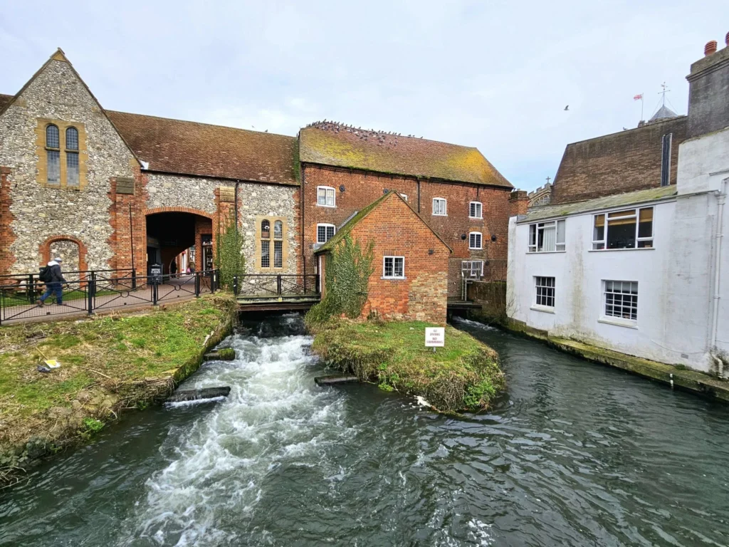 Cruising with Danny and Peter, MSC Cruises, MSC Preziosa, Southamton, London, England, United Kingdom, Stonehenge & Salisbury Tour, A breathtaking view of the Ancient Stone Circle at Stonehenge, showcasing its massive standing stones against the backdrop of the Wiltshire Countryside Trip. Visitors exploring this iconic Neolithic Monument Visit, a renowned UNESCO Heritage Site, as part of the MSC Preziosa Stonehenge and Salisbury Excursion. The towering spire of Salisbury Cathedral, the highlight of the Salisbury Cathedral Tour, stands majestically, housing the historic Magna Carta Exhibit. A scenic drive through the charming English villages on the English Countryside Tour, leading to a fascinating Medieval Town Exploration in Salisbury. This Southampton Shore Excursion offers an unforgettable journey through Historic England Landmarks, blending ancient wonders with medieval splendor.