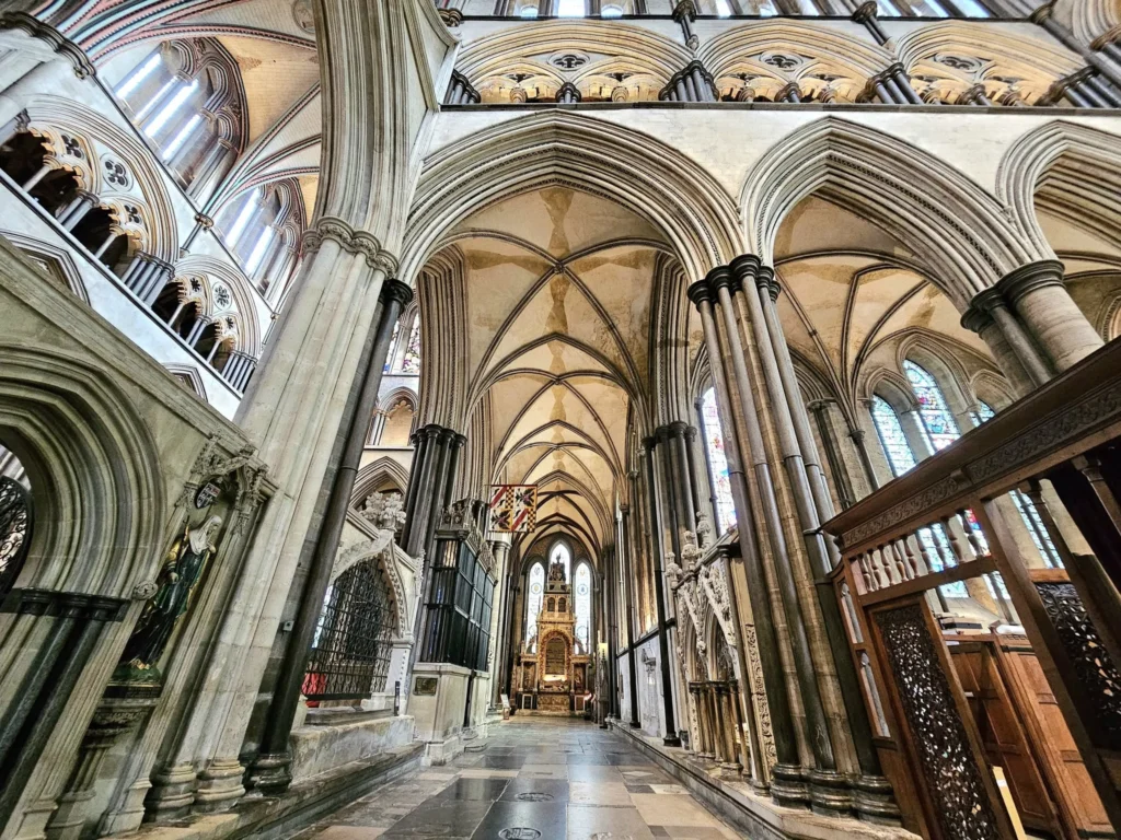 Cruising with Danny and Peter, MSC Cruises, MSC Preziosa, Southamton, London, England, United Kingdom, Stonehenge & Salisbury Tour, A breathtaking view of the Ancient Stone Circle at Stonehenge, showcasing its massive standing stones against the backdrop of the Wiltshire Countryside Trip. Visitors exploring this iconic Neolithic Monument Visit, a renowned UNESCO Heritage Site, as part of the MSC Preziosa Stonehenge and Salisbury Excursion. The towering spire of Salisbury Cathedral, the highlight of the Salisbury Cathedral Tour, stands majestically, housing the historic Magna Carta Exhibit. A scenic drive through the charming English villages on the English Countryside Tour, leading to a fascinating Medieval Town Exploration in Salisbury. This Southampton Shore Excursion offers an unforgettable journey through Historic England Landmarks, blending ancient wonders with medieval splendor.