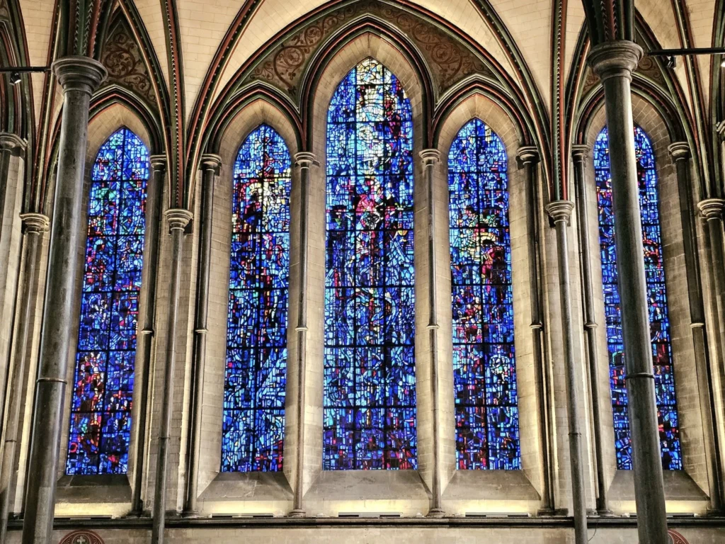 Cruising with Danny and Peter, MSC Cruises, MSC Preziosa, Southamton, London, England, United Kingdom, Stonehenge & Salisbury Tour, A breathtaking view of the Ancient Stone Circle at Stonehenge, showcasing its massive standing stones against the backdrop of the Wiltshire Countryside Trip. Visitors exploring this iconic Neolithic Monument Visit, a renowned UNESCO Heritage Site, as part of the MSC Preziosa Stonehenge and Salisbury Excursion. The towering spire of Salisbury Cathedral, the highlight of the Salisbury Cathedral Tour, stands majestically, housing the historic Magna Carta Exhibit. A scenic drive through the charming English villages on the English Countryside Tour, leading to a fascinating Medieval Town Exploration in Salisbury. This Southampton Shore Excursion offers an unforgettable journey through Historic England Landmarks, blending ancient wonders with medieval splendor.