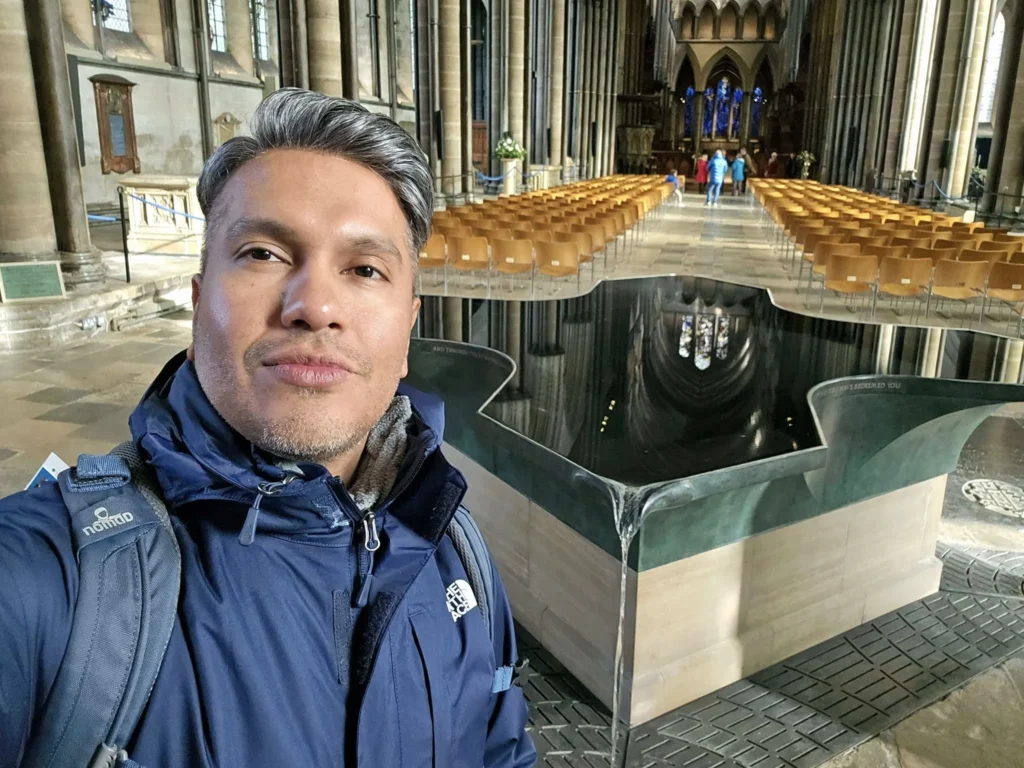 Cruising with Danny and Peter, MSC Cruises, MSC Preziosa, Southamton, London, England, United Kingdom, Stonehenge & Salisbury Tour, A breathtaking view of the Ancient Stone Circle at Stonehenge, showcasing its massive standing stones against the backdrop of the Wiltshire Countryside Trip. Visitors exploring this iconic Neolithic Monument Visit, a renowned UNESCO Heritage Site, as part of the MSC Preziosa Stonehenge and Salisbury Excursion. The towering spire of Salisbury Cathedral, the highlight of the Salisbury Cathedral Tour, stands majestically, housing the historic Magna Carta Exhibit. A scenic drive through the charming English villages on the English Countryside Tour, leading to a fascinating Medieval Town Exploration in Salisbury. This Southampton Shore Excursion offers an unforgettable journey through Historic England Landmarks, blending ancient wonders with medieval splendor.