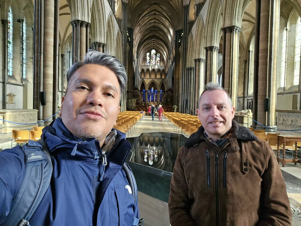 Cruising with Danny and Peter, MSC Cruises, MSC Preziosa, Southamton, London, England, United Kingdom, Stonehenge & Salisbury Tour, A breathtaking view of the Ancient Stone Circle at Stonehenge, showcasing its massive standing stones against the backdrop of the Wiltshire Countryside Trip. Visitors exploring this iconic Neolithic Monument Visit, a renowned UNESCO Heritage Site, as part of the MSC Preziosa Stonehenge and Salisbury Excursion. The towering spire of Salisbury Cathedral, the highlight of the Salisbury Cathedral Tour, stands majestically, housing the historic Magna Carta Exhibit. A scenic drive through the charming English villages on the English Countryside Tour, leading to a fascinating Medieval Town Exploration in Salisbury. This Southampton Shore Excursion offers an unforgettable journey through Historic England Landmarks, blending ancient wonders with medieval splendor.