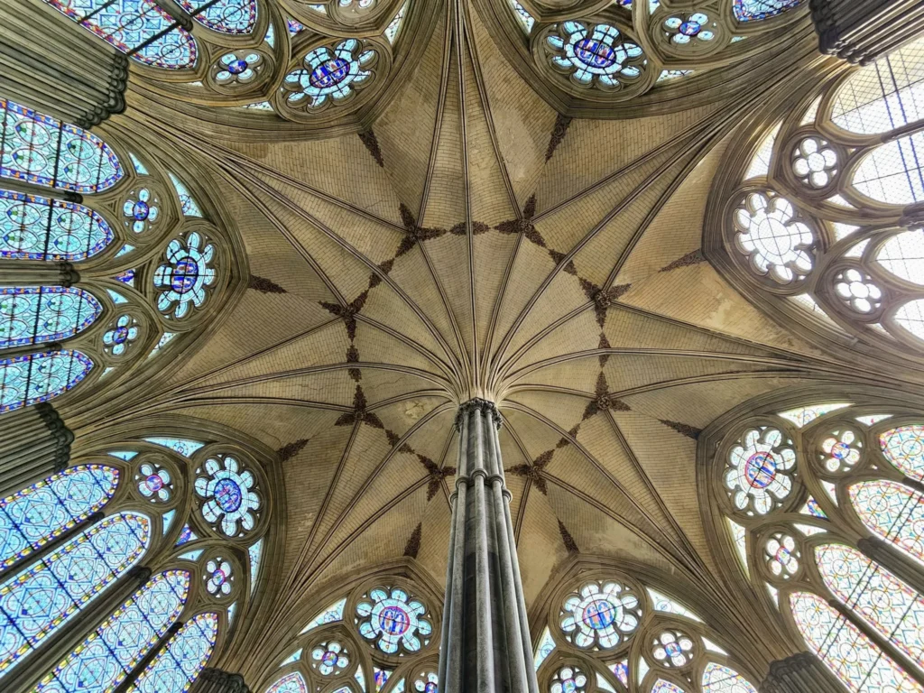 Cruising with Danny and Peter, MSC Cruises, MSC Preziosa, Southamton, London, England, United Kingdom, Stonehenge & Salisbury Tour, A breathtaking view of the Ancient Stone Circle at Stonehenge, showcasing its massive standing stones against the backdrop of the Wiltshire Countryside Trip. Visitors exploring this iconic Neolithic Monument Visit, a renowned UNESCO Heritage Site, as part of the MSC Preziosa Stonehenge and Salisbury Excursion. The towering spire of Salisbury Cathedral, the highlight of the Salisbury Cathedral Tour, stands majestically, housing the historic Magna Carta Exhibit. A scenic drive through the charming English villages on the English Countryside Tour, leading to a fascinating Medieval Town Exploration in Salisbury. This Southampton Shore Excursion offers an unforgettable journey through Historic England Landmarks, blending ancient wonders with medieval splendor.