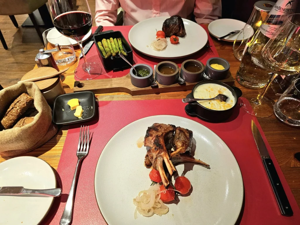 Cruising with Danny and Peter, MSC Cruises, MSC Preziosa, Southamton, London, England, United Kingdom, Stonehenge & Salisbury Tour, A breathtaking view of the Ancient Stone Circle at Stonehenge, showcasing its massive standing stones against the backdrop of the Wiltshire Countryside Trip. Visitors exploring this iconic Neolithic Monument Visit, a renowned UNESCO Heritage Site, as part of the MSC Preziosa Stonehenge and Salisbury Excursion. The towering spire of Salisbury Cathedral, the highlight of the Salisbury Cathedral Tour, stands majestically, housing the historic Magna Carta Exhibit. A scenic drive through the charming English villages on the English Countryside Tour, leading to a fascinating Medieval Town Exploration in Salisbury. This Southampton Shore Excursion offers an unforgettable journey through Historic England Landmarks, blending ancient wonders with medieval splendor.