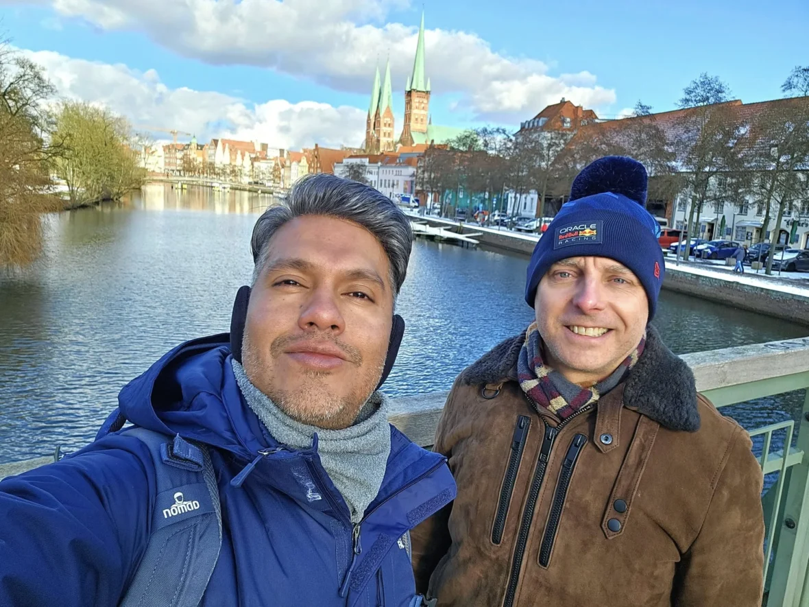 Cruising with Danny and Peter, MSC Cruises, MSC Preziosa, Hamburg, Germany, Lubeck City Tour showcasing the Holsten Gate, a historic medieval landmark with iconic round towers; St. Mary’s Church, known for its Gothic architecture and the world’s largest mechanical organ; charming cobblestone streets and UNESCO Heritage sites of Lubeck, reflecting its Hanseatic League history; traditional German lunch featuring bratwurst, sauerkraut, pretzels, and Lubeck’s famous marzipan, offering a taste of the city’s cultural and culinary heritage.