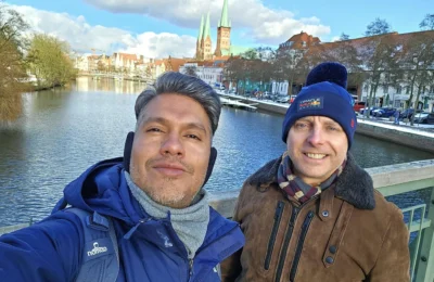 Cruising with Danny and Peter, MSC Cruises, MSC Preziosa, Hamburg, Germany, Lubeck City Tour showcasing the Holsten Gate, a historic medieval landmark with iconic round towers; St. Mary’s Church, known for its Gothic architecture and the world’s largest mechanical organ; charming cobblestone streets and UNESCO Heritage sites of Lubeck, reflecting its Hanseatic League history; traditional German lunch featuring bratwurst, sauerkraut, pretzels, and Lubeck’s famous marzipan, offering a taste of the city’s cultural and culinary heritage.