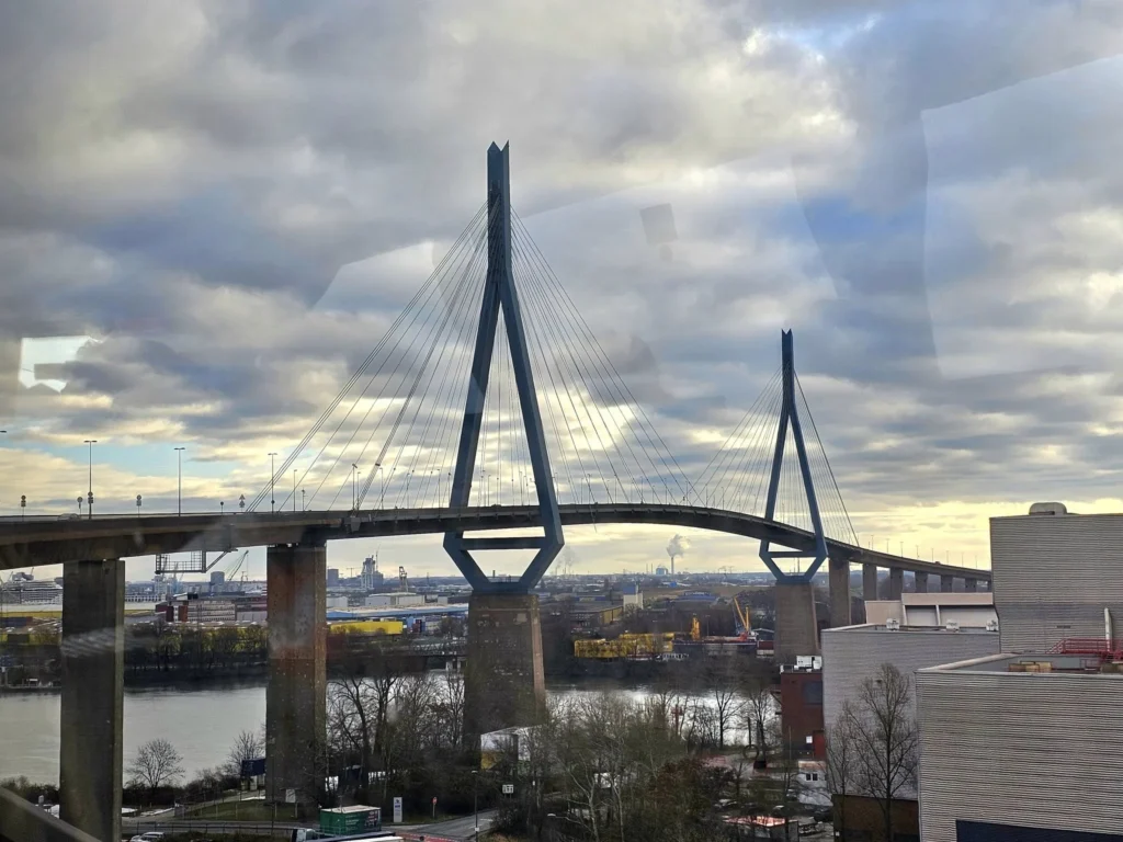 Cruising with Danny and Peter, MSC Cruises, MSC Preziosa, Hamburg, Germany, Lubeck City Tour showcasing the Holsten Gate, a historic medieval landmark with iconic round towers; St. Mary’s Church, known for its Gothic architecture and the world’s largest mechanical organ; charming cobblestone streets and UNESCO Heritage sites of Lubeck, reflecting its Hanseatic League history; traditional German lunch featuring bratwurst, sauerkraut, pretzels, and Lubeck’s famous marzipan, offering a taste of the city’s cultural and culinary heritage.