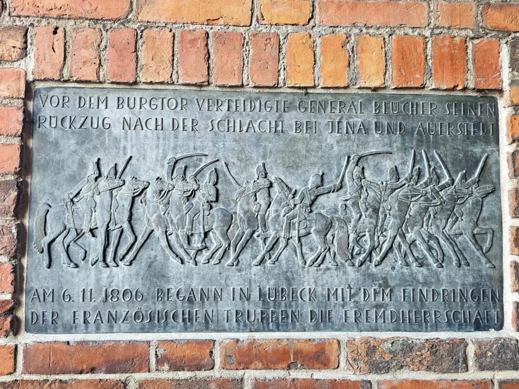Cruising with Danny and Peter, MSC Cruises, MSC Preziosa, Hamburg, Germany, Lubeck City Tour showcasing the Holsten Gate, a historic medieval landmark with iconic round towers; St. Mary’s Church, known for its Gothic architecture and the world’s largest mechanical organ; charming cobblestone streets and UNESCO Heritage sites of Lubeck, reflecting its Hanseatic League history; traditional German lunch featuring bratwurst, sauerkraut, pretzels, and Lubeck’s famous marzipan, offering a taste of the city’s cultural and culinary heritage.