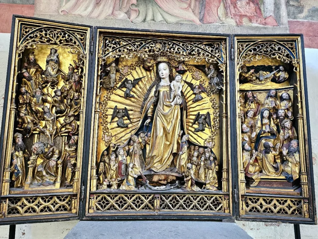 Cruising with Danny and Peter, MSC Cruises, MSC Preziosa, Hamburg, Germany, Lubeck City Tour showcasing the Holsten Gate, a historic medieval landmark with iconic round towers; St. Mary’s Church, known for its Gothic architecture and the world’s largest mechanical organ; charming cobblestone streets and UNESCO Heritage sites of Lubeck, reflecting its Hanseatic League history; traditional German lunch featuring bratwurst, sauerkraut, pretzels, and Lubeck’s famous marzipan, offering a taste of the city’s cultural and culinary heritage.