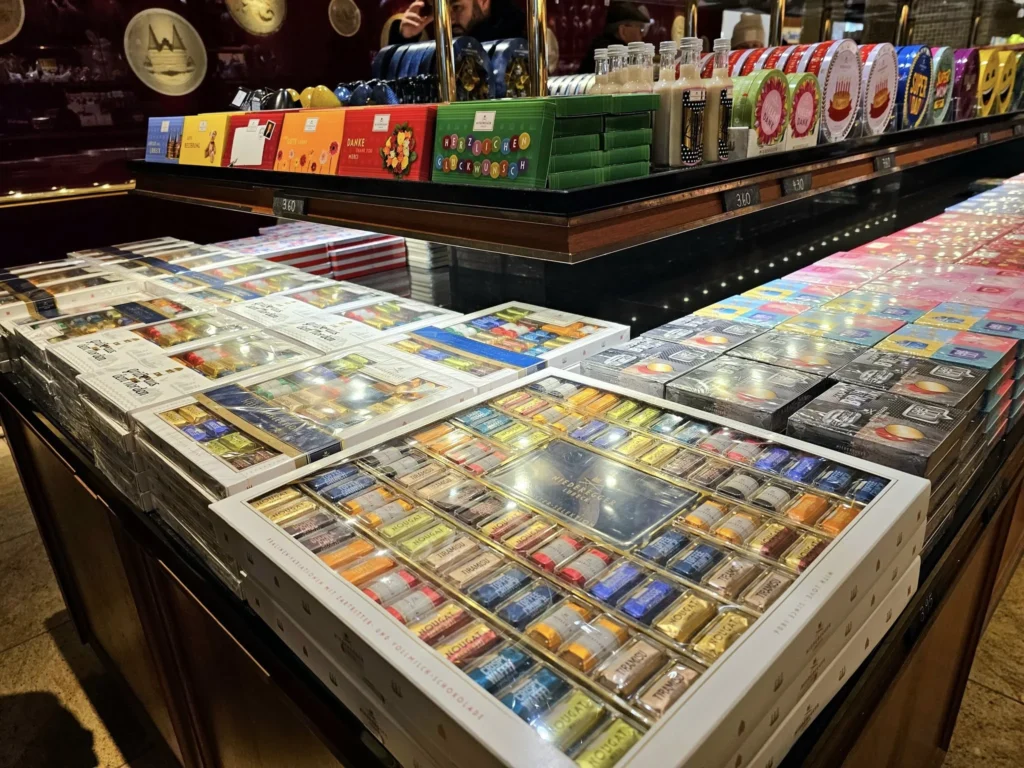 Cruising with Danny and Peter, MSC Cruises, MSC Preziosa, Hamburg, Germany, Lubeck City Tour showcasing the Holsten Gate, a historic medieval landmark with iconic round towers; St. Mary’s Church, known for its Gothic architecture and the world’s largest mechanical organ; charming cobblestone streets and UNESCO Heritage sites of Lubeck, reflecting its Hanseatic League history; traditional German lunch featuring bratwurst, sauerkraut, pretzels, and Lubeck’s famous marzipan, offering a taste of the city’s cultural and culinary heritage.