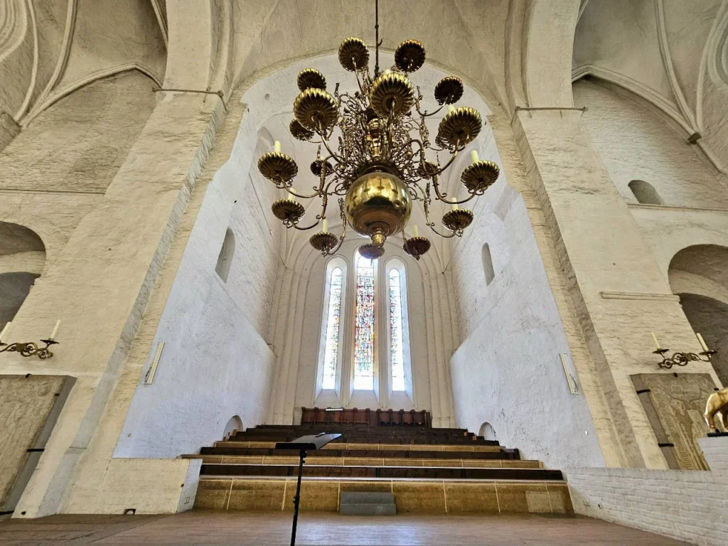 Cruising with Danny and Peter, MSC Cruises, MSC Preziosa, Hamburg, Germany, Lubeck City Tour showcasing the Holsten Gate, a historic medieval landmark with iconic round towers; St. Mary’s Church, known for its Gothic architecture and the world’s largest mechanical organ; charming cobblestone streets and UNESCO Heritage sites of Lubeck, reflecting its Hanseatic League history; traditional German lunch featuring bratwurst, sauerkraut, pretzels, and Lubeck’s famous marzipan, offering a taste of the city’s cultural and culinary heritage.