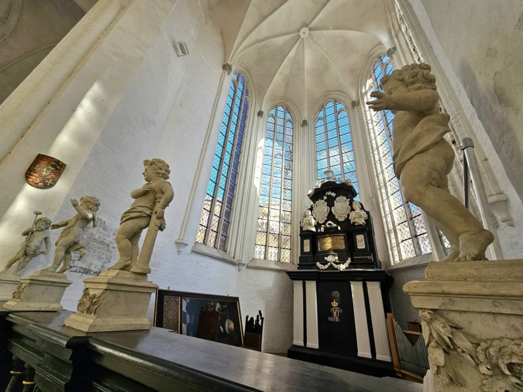 Cruising with Danny and Peter, MSC Cruises, MSC Preziosa, Hamburg, Germany, Lubeck City Tour showcasing the Holsten Gate, a historic medieval landmark with iconic round towers; St. Mary’s Church, known for its Gothic architecture and the world’s largest mechanical organ; charming cobblestone streets and UNESCO Heritage sites of Lubeck, reflecting its Hanseatic League history; traditional German lunch featuring bratwurst, sauerkraut, pretzels, and Lubeck’s famous marzipan, offering a taste of the city’s cultural and culinary heritage.