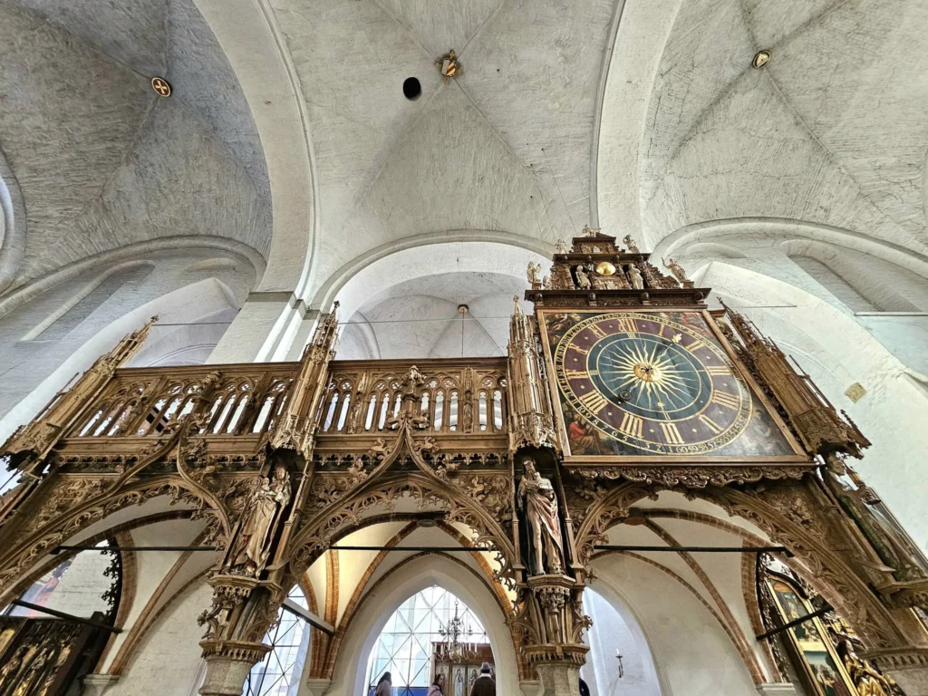 Cruising with Danny and Peter, MSC Cruises, MSC Preziosa, Hamburg, Germany, Lubeck City Tour showcasing the Holsten Gate, a historic medieval landmark with iconic round towers; St. Mary’s Church, known for its Gothic architecture and the world’s largest mechanical organ; charming cobblestone streets and UNESCO Heritage sites of Lubeck, reflecting its Hanseatic League history; traditional German lunch featuring bratwurst, sauerkraut, pretzels, and Lubeck’s famous marzipan, offering a taste of the city’s cultural and culinary heritage.