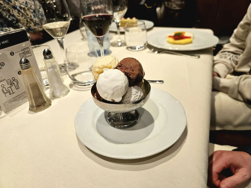 Cruising with Danny and Peter, MSC Cruises, MSC Preziosa, Hamburg, Germany, Lubeck City Tour showcasing the Holsten Gate, a historic medieval landmark with iconic round towers; St. Mary’s Church, known for its Gothic architecture and the world’s largest mechanical organ; charming cobblestone streets and UNESCO Heritage sites of Lubeck, reflecting its Hanseatic League history; traditional German lunch featuring bratwurst, sauerkraut, pretzels, and Lubeck’s famous marzipan, offering a taste of the city’s cultural and culinary heritage.