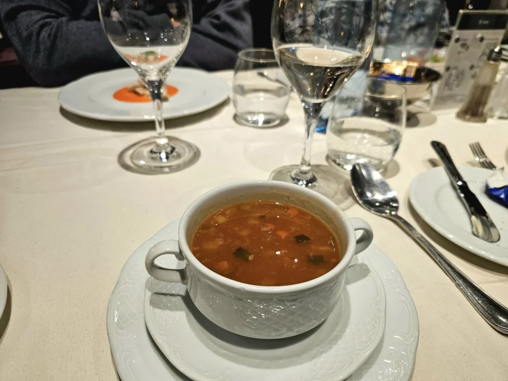 Cruising with Danny and Peter, MSC Cruises, MSC Preziosa, Hamburg, Germany, Lubeck City Tour showcasing the Holsten Gate, a historic medieval landmark with iconic round towers; St. Mary’s Church, known for its Gothic architecture and the world’s largest mechanical organ; charming cobblestone streets and UNESCO Heritage sites of Lubeck, reflecting its Hanseatic League history; traditional German lunch featuring bratwurst, sauerkraut, pretzels, and Lubeck’s famous marzipan, offering a taste of the city’s cultural and culinary heritage.