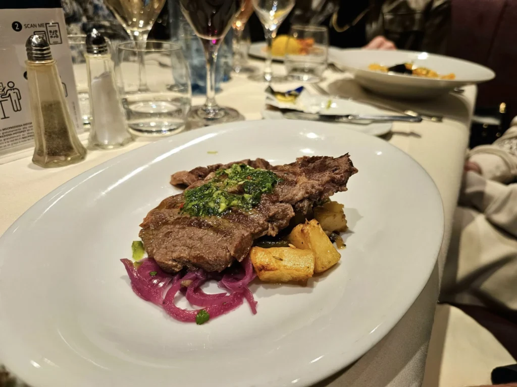 Cruising with Danny and Peter, MSC Cruises, MSC Preziosa, Hamburg, Germany, Lubeck City Tour showcasing the Holsten Gate, a historic medieval landmark with iconic round towers; St. Mary’s Church, known for its Gothic architecture and the world’s largest mechanical organ; charming cobblestone streets and UNESCO Heritage sites of Lubeck, reflecting its Hanseatic League history; traditional German lunch featuring bratwurst, sauerkraut, pretzels, and Lubeck’s famous marzipan, offering a taste of the city’s cultural and culinary heritage.