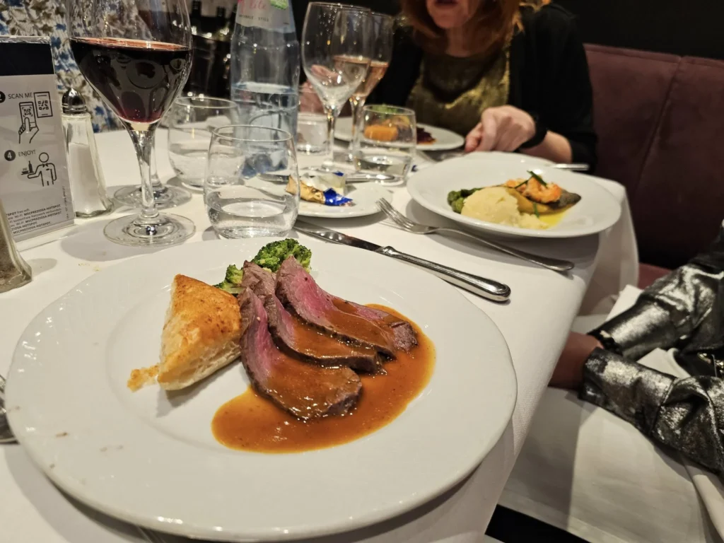 Cruising with Danny and Peter, MSC Cruises, MSC Preziosa, Rotterdam, The Netherlands, Luxury North Sea cruise experience aboard MSC Preziosa, sailing from Hamburg, Germany to Rotterdam, The Netherlands. The journey includes stunning harbor views, vibrant cityscapes, elegant onboard dining, a memorable Gala Dinner at L'Arabesque, world-class entertainment in the Platinum Theatre, and breathtaking final views of Rotterdam’s iconic landmarks like the Erasmus Bridge and SS Rotterdam. Highlights also feature luxurious amenities, scenic North Sea travel, and cultural experiences, offering a truly unforgettable European cruise adventure.