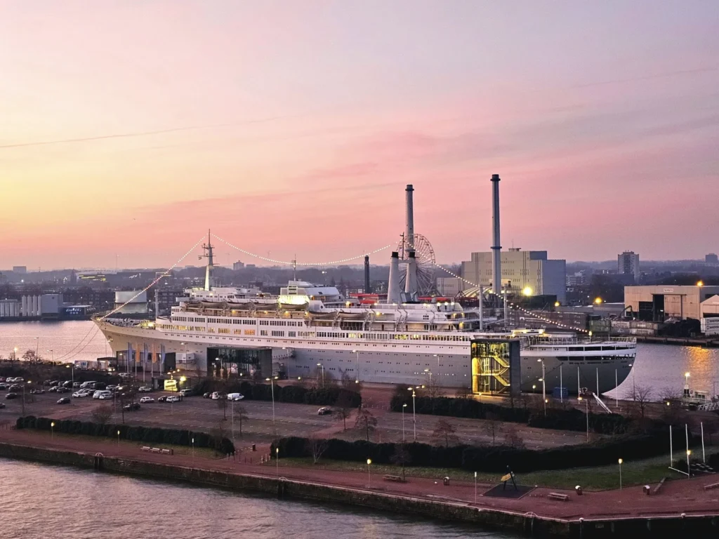 Cruising with Danny and Peter, MSC Cruises, MSC Preziosa, Rotterdam, The Netherlands, Luxury North Sea cruise experience aboard MSC Preziosa, sailing from Hamburg, Germany to Rotterdam, The Netherlands. The journey includes stunning harbor views, vibrant cityscapes, elegant onboard dining, a memorable Gala Dinner at L'Arabesque, world-class entertainment in the Platinum Theatre, and breathtaking final views of Rotterdam’s iconic landmarks like the Erasmus Bridge and SS Rotterdam. Highlights also feature luxurious amenities, scenic North Sea travel, and cultural experiences, offering a truly unforgettable European cruise adventure.