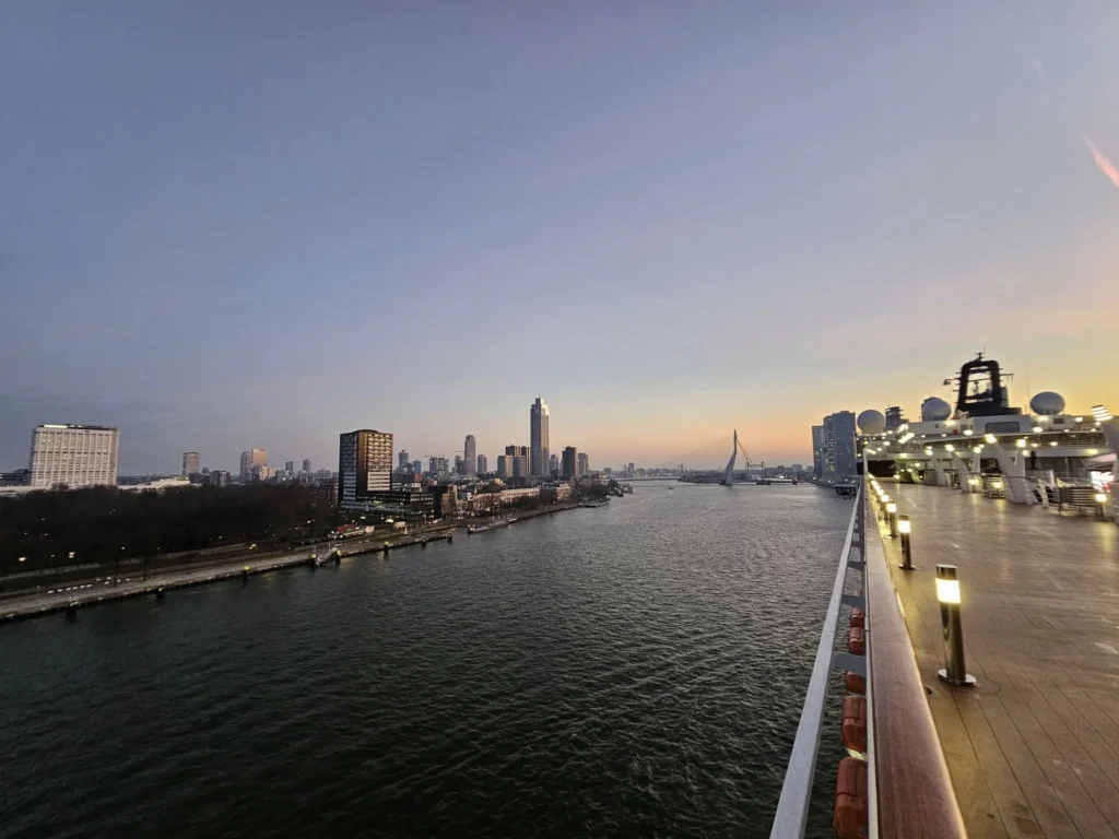 Cruising with Danny and Peter, MSC Cruises, MSC Preziosa, Rotterdam, The Netherlands, Luxury North Sea cruise experience aboard MSC Preziosa, sailing from Hamburg, Germany to Rotterdam, The Netherlands. The journey includes stunning harbor views, vibrant cityscapes, elegant onboard dining, a memorable Gala Dinner at L'Arabesque, world-class entertainment in the Platinum Theatre, and breathtaking final views of Rotterdam’s iconic landmarks like the Erasmus Bridge and SS Rotterdam. Highlights also feature luxurious amenities, scenic North Sea travel, and cultural experiences, offering a truly unforgettable European cruise adventure.