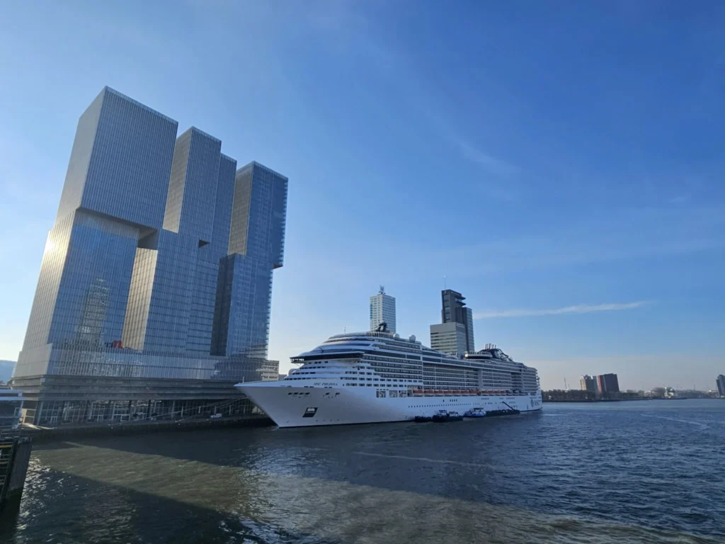 Cruising with Danny and Peter, MSC Cruises, MSC Preziosa, Rotterdam, The Netherlands, Luxury North Sea cruise experience aboard MSC Preziosa, sailing from Hamburg, Germany to Rotterdam, The Netherlands. The journey includes stunning harbor views, vibrant cityscapes, elegant onboard dining, a memorable Gala Dinner at L'Arabesque, world-class entertainment in the Platinum Theatre, and breathtaking final views of Rotterdam’s iconic landmarks like the Erasmus Bridge and SS Rotterdam. Highlights also feature luxurious amenities, scenic North Sea travel, and cultural experiences, offering a truly unforgettable European cruise adventure.