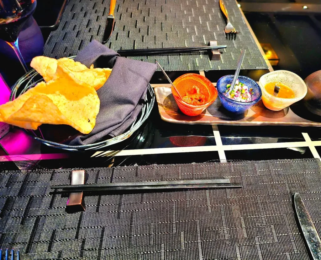 Cruising with Danny and Peter, Holland America Line, Nieuw Statendam, Sea Day | Elegant Gala Dinner at Tamarind on MS Nieuw Statendam featuring luxurious Asian fusion cuisine, exquisite dining setting, and impeccable service aboard a Holland America cruise.